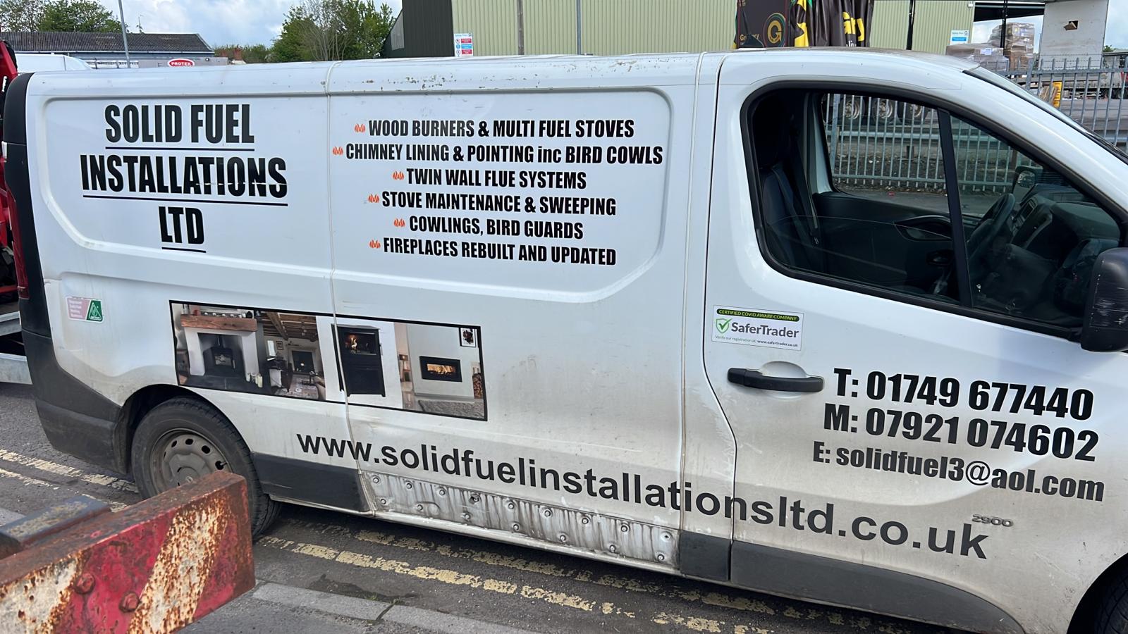 Solid Fuel Installations Ltd service van showing company services and contact details